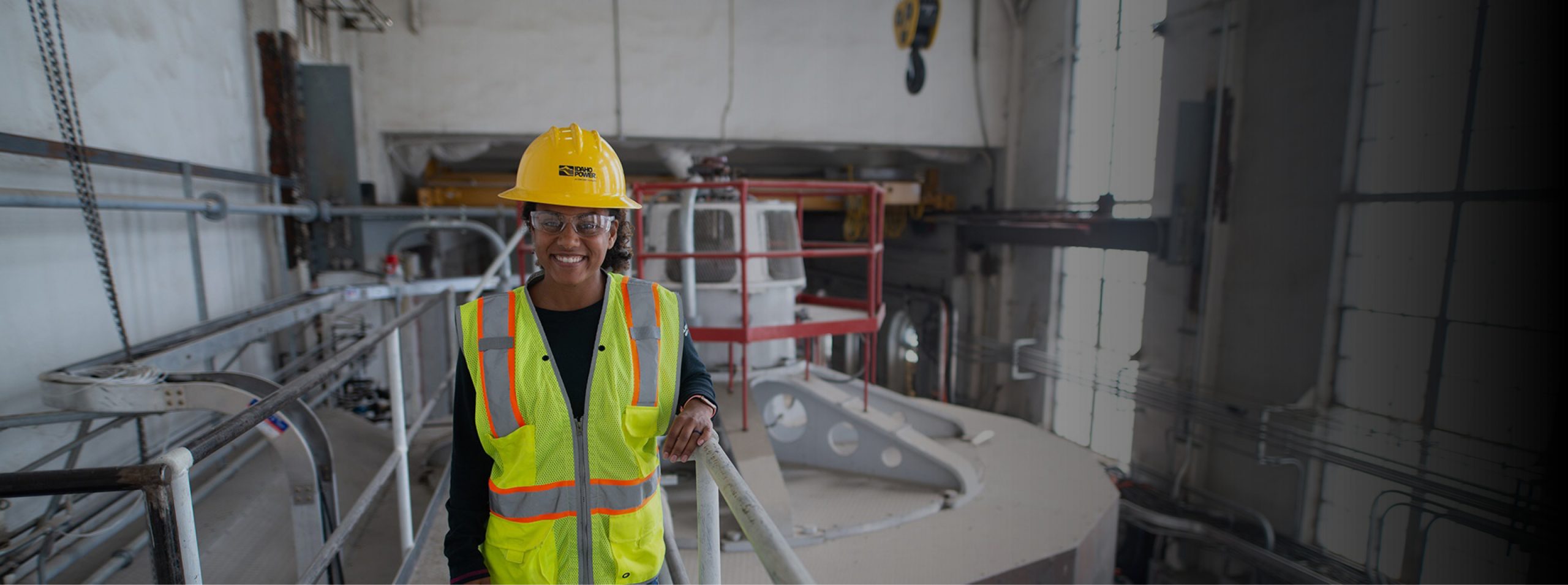 Image of an Idaho Power female engineer in a power plant