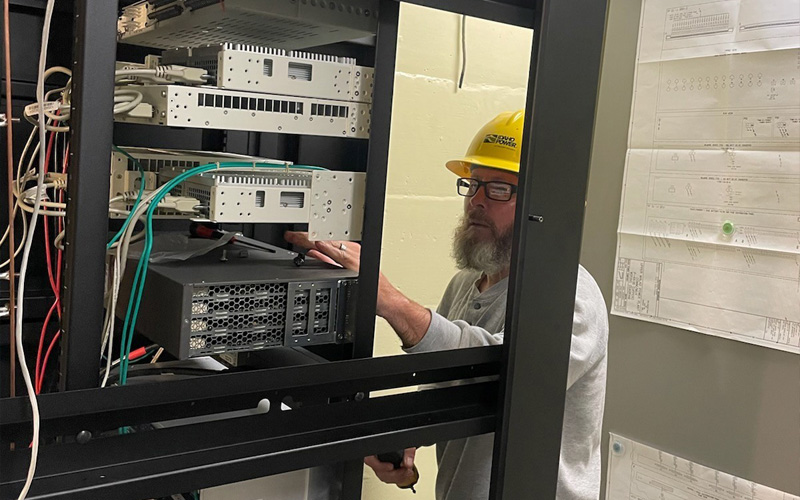 Communications technician working