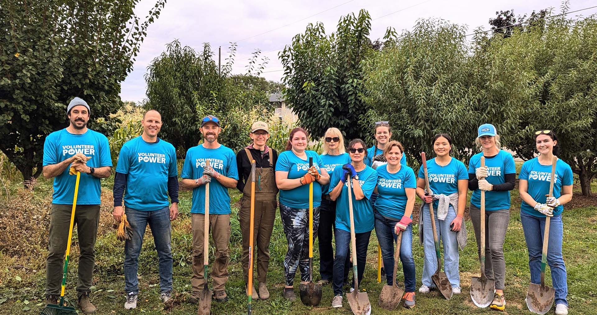 Idaho Power employees volunteering with shovels and standing for a group photo
