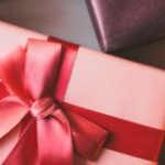 Permalink to Give the Gift of Energy Savings Pictures of holiday gifts wrapped in various shades of red.