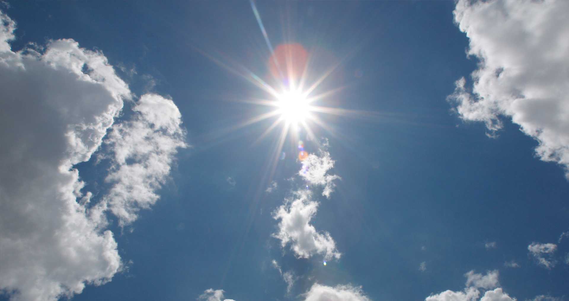 Sun shining through the clouds