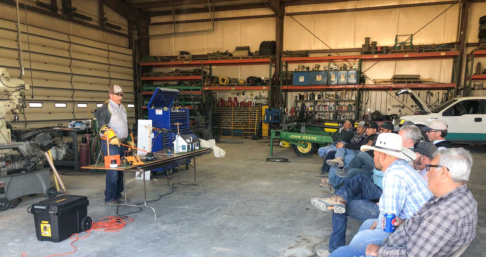 picture of ag rep talking to a group of people