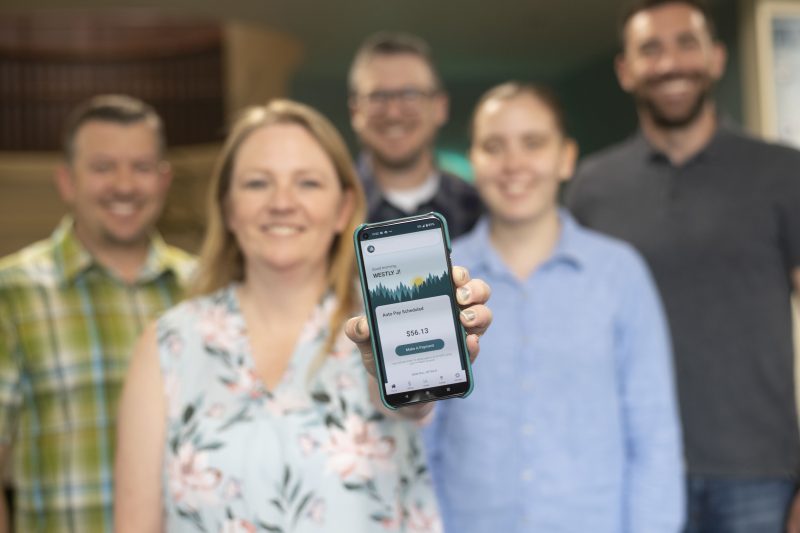 Image of a cell phone with the Idaho Power mobile app displayed.