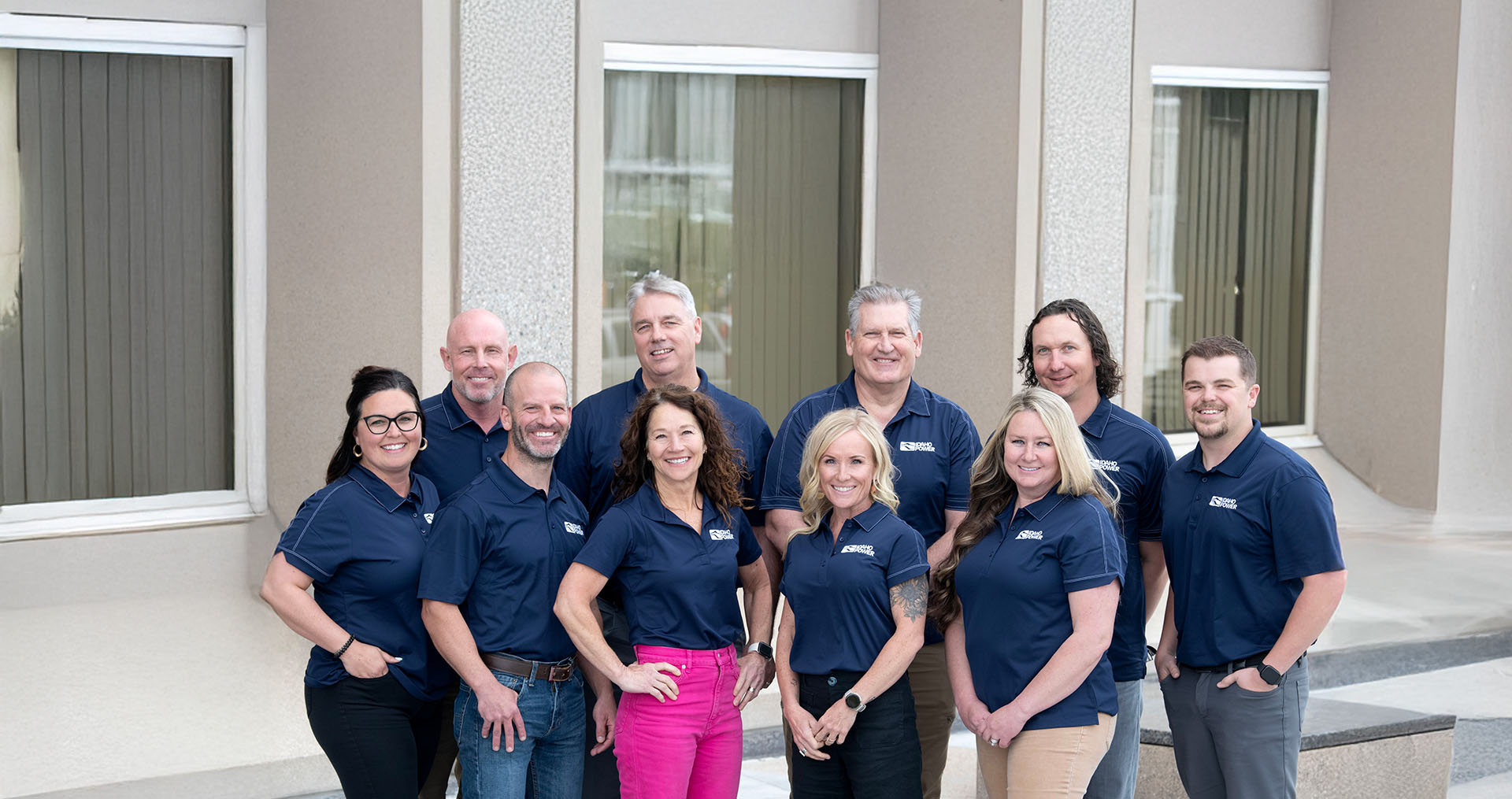 Idaho Power employees who are key account energy advisors standing in a group