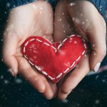 Permalink to Donations Boost Salvation Army’s Project Share to Help with Energy Bills An image of two hands holding a small heart pillow.