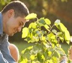 Permalink to Magic Valley Residents May Be Eligible to Receive Free Trees Through Idaho Power’s Shade Tree Project Dad and child planting a tree.