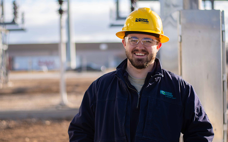 Stations technician smiling at the camera